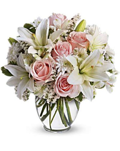 <div id="mark-3" class="m-pdp-tabs-marketing-description">Express your love with the eloquence of Shakespeare - without saying a word. She'll adore this exquisite bouquet of roses and lilies and other pastel favorites in a classic ginger vase. And she'll know just the words to let you know.</div>
<p> </p>
<div id="desc-3">
<ul>
<li>Light pink roses, white asiatic lilies, white alstroemeria and white cushion spray chrysanthemums are mixed with white statice and variegated pittosporum in a clear, rounded vase.</li>
</ul>
</div>