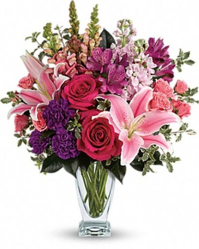 <div class="m-pdp-tabs-description">
<div id="mark-3" class="m-pdp-tabs-marketing-description">Hand-delivered in a shapely glass vase, this sumptuous arrangement of roses and lilies is a lavish way to celebrate a special day - or surprise someone just because!</div>
</div>
<p id="arrngDescp">Hot pink roses, pink spray roses, pink oriental lilies, purple alstroemeria, purple carnations, light pink stock and pink snapdragons are arranged with pitta negra and camellia leaves. Delivered in a clear Couture vase.</p>